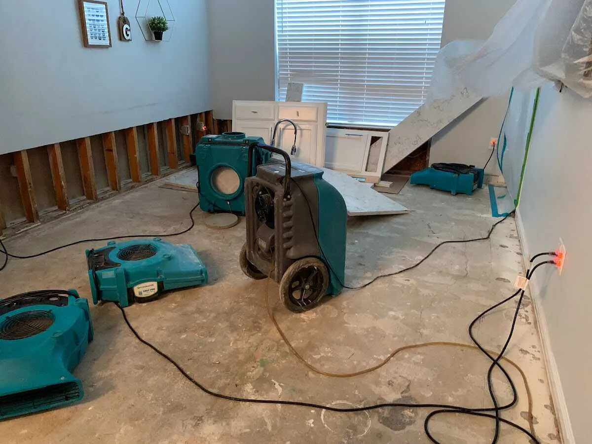 Dehumidifier in flood-cut room for Water Damage Restoration in Old Forge